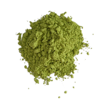 Green powder on a white background
