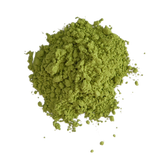 Green powder on a white background